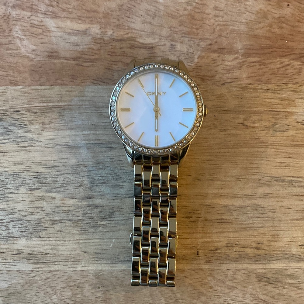 DKNY Gold Watch with mother of pearl face